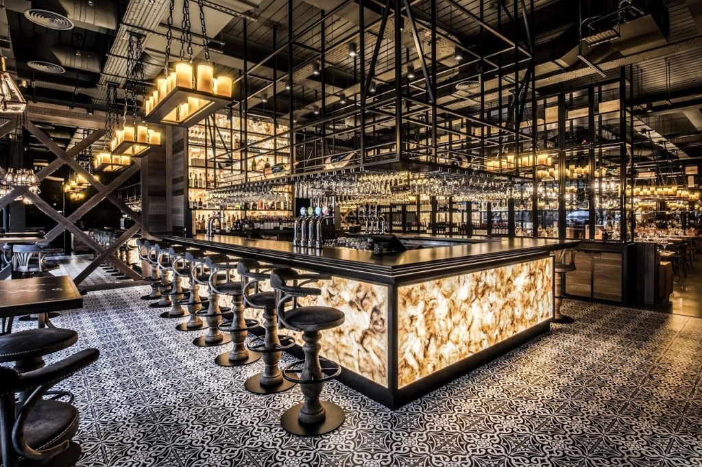 Cohesive design with unified color scheme and materials throughout the space.