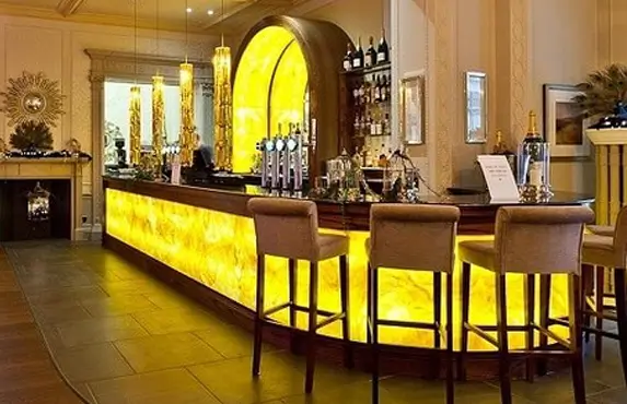 Contemporary casino interior with sculptural lighting and artistic accents for a bold, standout look.